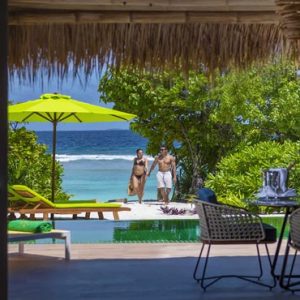 Maldives Honeymoon Packages Emerald Resort & Spa Couple By Villa Pool