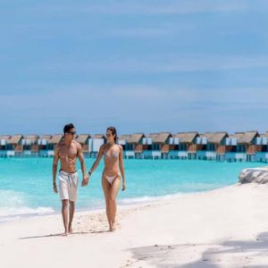 Maldives Honeymoon Packages Emerald Resort & Spa Couple On Beach