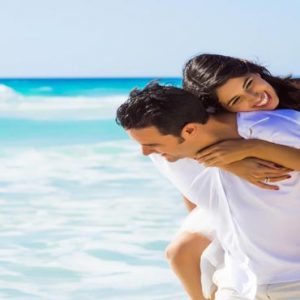 Maldives Honeymoon Packages Emerald Resort & Spa Couple On Beach1