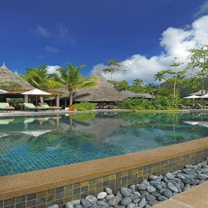 Constance Ephelia - Luxury Seychelles Honeymoon Packages - Helios restaurant and bar pool view