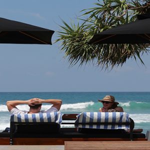 Couple On Sun Loungers At Sea The Fortress Resort & Spa Sri Lanka Honeymoons