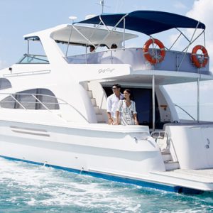 Maldives Honeymoon Packages Conrad Maldives Rangali Island Couple On Boat1