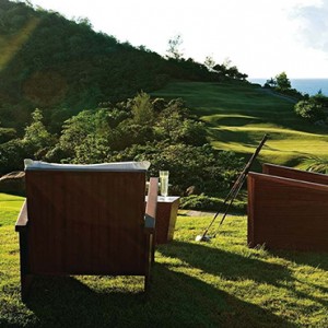 Constance Lemuria - Luxury Seychelles Honeymoon Packages - relaxing on the golf course