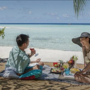Couple Having Picnic On Beach The Residence Maldives At Falhumaafushi Maldives Honeymoons