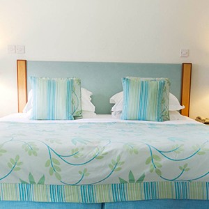 Calabash Hotel - Grenada Honeymoon Packages - bed