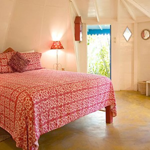 The Caves - Jamaica Honeymoon Packages - bedroom