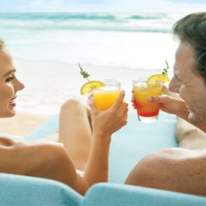 Mexico Honeymoon Packages Sun Palace Cancun Beach Couple Toast