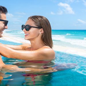 Mexico Honeymoon Packages Sun Palace Cancun Couple In Pool