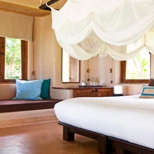 the naka island phuket - thailand honeymoon packages - bedroom