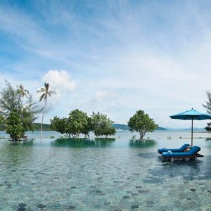 the naka island phuket - thailand honeymoon packages - main pool