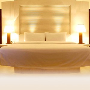 the racha phuket - thailand honeymoon packages - bedroom