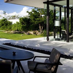 alila villas uluwatu - bali honeymoon packages - table and chairs