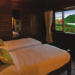Enchanted Island Resort - Seychelles Luxury Honeymoons - bedroom