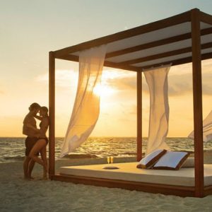 Mexico Honeymoon Packages Secrets Playa Mujeres Couple By Bali Beach Bed