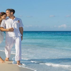 Mexico Honeymoon Packages Dream Jade Resort & Spa Bride & Groom On Beach