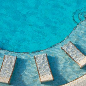 Mexico Honeymoon Packages Dream Jade Resort & Spa Couple In Infinity Pool