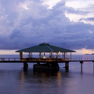Coco de Mer & Black Parrot Suites - Luxury Seychelles Honeymoon Packages - deck at night