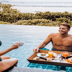 Maldives Honeymoon Packages Shangri La’s Villingili Resort And Spa Couple In Pool