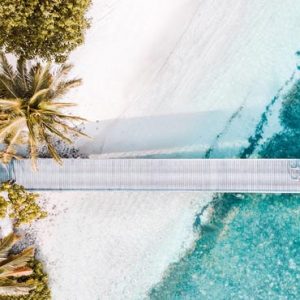 Maldives Honeymoon Packages Shangri La’s Villingili Resort And Spa Couple Cycling On Jetty Aerial View