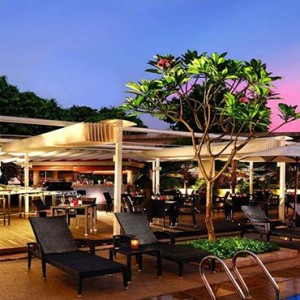 Park Hotel Clarke Quay - Luxury Singapore Honeymoon packages - Cocobolo poolside bar exterior at night
