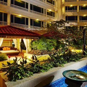 Park Hotel Clarke Quay - Luxury Singapore Honeymoon packages - exterior cabana by pool at night