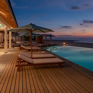 Pool And Sun Loungers At Night Cinnamon Hakuraa Huraa Maldives Honeymoons