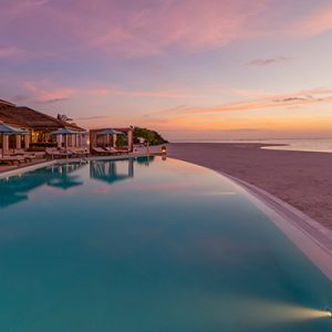 Pool At Sunset Cinnamon Hakuraa Huraa Maldives Honeymoons