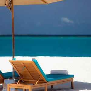 beach - The sun Sivam Iru Fushi - Luxury Maldives Honeymoons