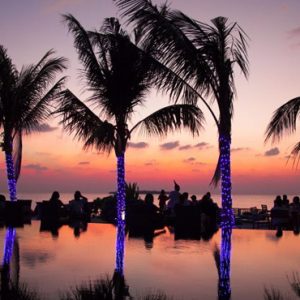 Pool Sunset Dhigufaru Island Resort Maldives Honeymoons