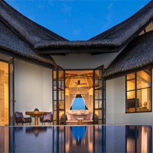 jumeriah-vittaveli-maldives-honeymoon-water-villa-with-pool-sunset