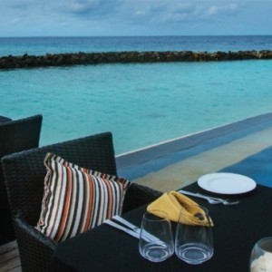 pool-side-vivanta-by-taj-coral-reef-luxury-maldives-honeymoon-packages