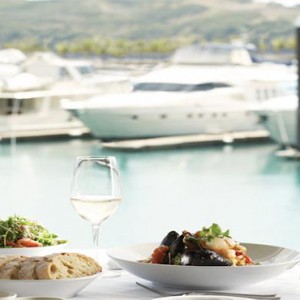 Beach Club Hamilton Islands - Australia Honeymoon Packages - Beach club dinner with a view