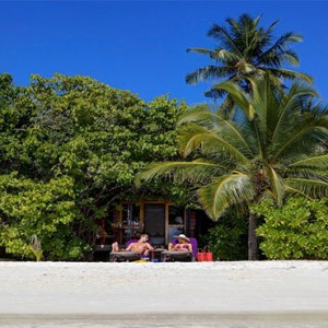 Komandoo Island Resort - Maldives honeymoon packages - Beach villa beach