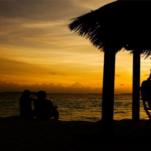 Reethi Beach Resort - Maldives Honeymoon Packages - Beach bar at sunset