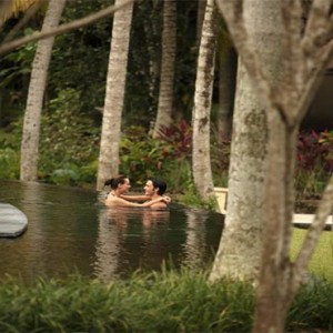 The Ubud Village Resort & Spa - Bali Honeymoon Packages - Couple in the pool