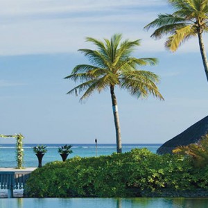 Four Seasons Resort Maldives at Kuda Huraa - Maldives Honeymoon Packages - Wedding ceremony at pool island