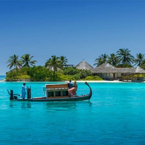 Four Seasons Resort Maldives at Kuda Huraa - Maldives Honeymoon Packages - dhoni to island spa