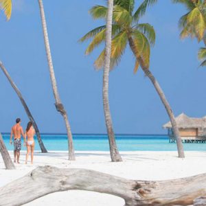 Maldives Honeymoon Packages Gili Lankanfushi Couple On Beach