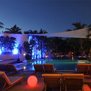 pool at night - Dreams Sands Cancun Resort & Spa - Mexico Luxury honeymoon packages