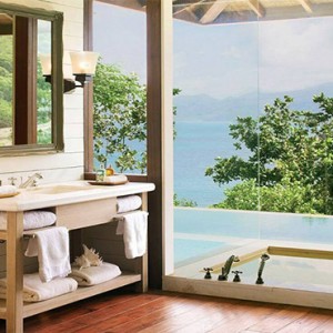 Four Seasons Resort Seychelles - Luxury Seychelles Honeymoon packages - Hilltop ocean view villa bathroom