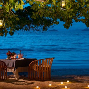 Four Seasons Resort Seychelles - Luxury Seychelles Honeymoon packages - Romantic beach dinner