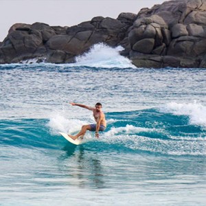 Four Seasons Resort Seychelles - Luxury Seychelles Honeymoon packages - surfing