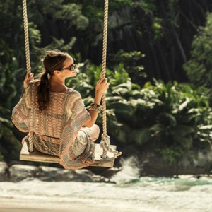 Four Seasons Resort Seychelles - Luxury Seychelles Honeymoon packages - swing on beach