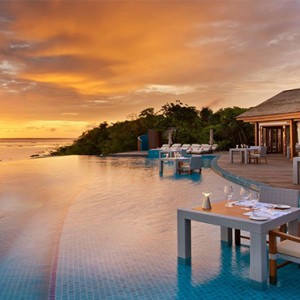 Hideaway Beach Resort and Spa - Luxury Maldives honeymoon packages - sunset pool cafe exterior