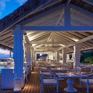 Loama Resort Maldives at Maamigili - Luxury Maldives Honeymoon packages - Iru cafe at dusk