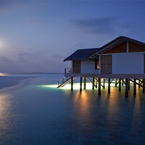 Loama Resort Maldives at Maamigili - Luxury Maldives Honeymoon packages - Ocean villa at night