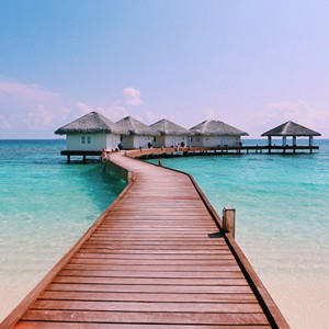 Loama Resort Maldives at Maamigili - Luxury Maldives Honeymoon packages - Overwater jetty