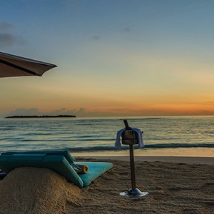 Loama Resort Maldives at Maamigili - Luxury Maldives Honeymoon packages - Sandbank at dawn