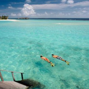 Loama Resort Maldives at Maamigili - Luxury Maldives Honeymoon packages - Snorkelling