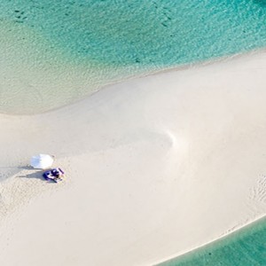 Soneva Jani - Maldives Luxury Honeymoon packages - sandbank dining